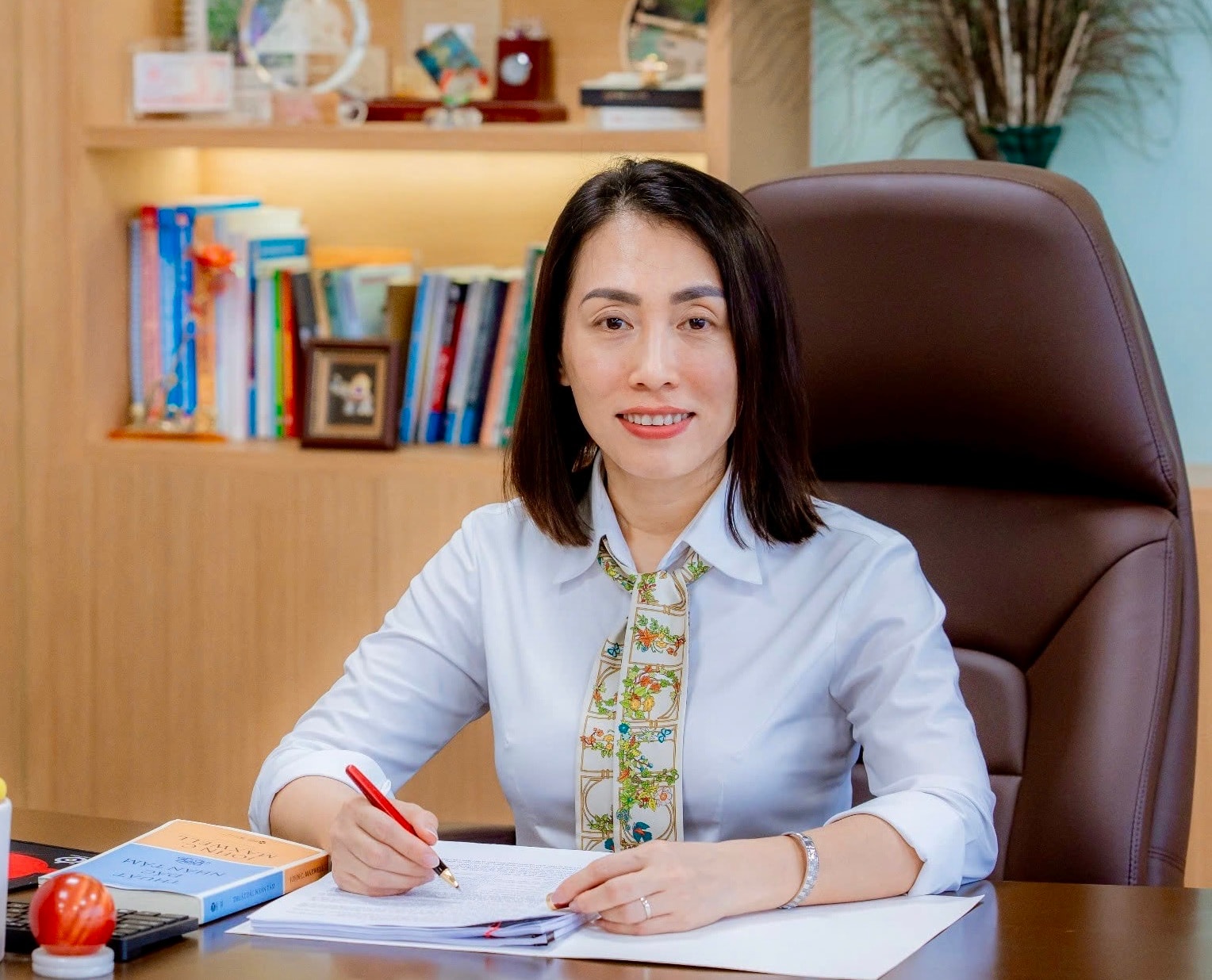 1. Paní Nguyen Thanh Thuy - ředitelka BIDV Phu My