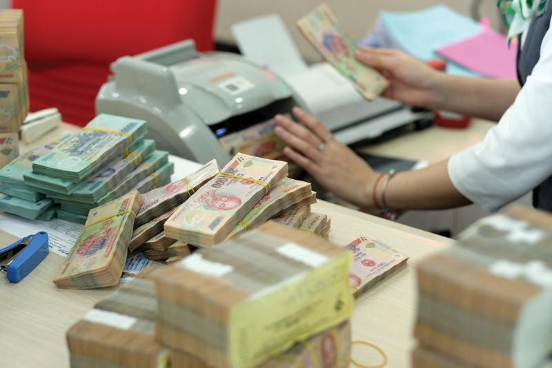 Hoàn thiện khuôn khổ pháp lý cho hoạt động quản lý nợ, xử lý tài sản của TCTD